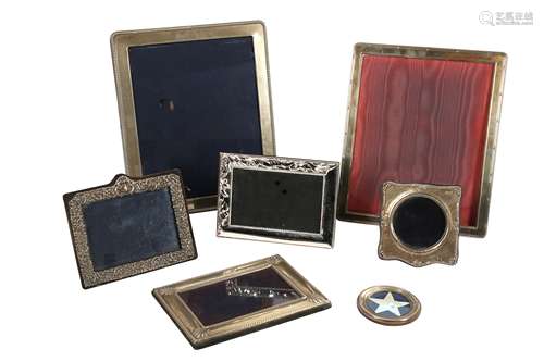 A COLLECTION OF SILVER PHOTOGRAPH FRAMES