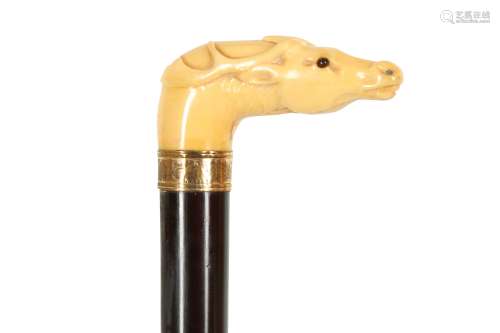 A CARVED MARINE IVORY HANDLED WALKING CANE, 19TH CENTURY