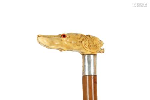 A CARVED MARINE IVORY HANDLED WALKING CANE, 19TH CENTURY