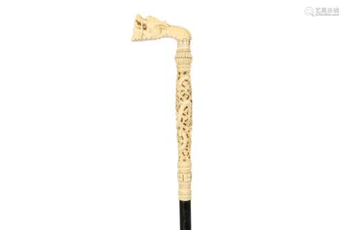 A CANTONESE CARVED IVORY HANDLED WALKING CANE, CHINA 19TH CE...