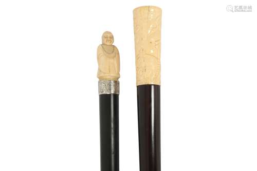 TWO CARVED BONE HANDLED WALKING CANES, EARLY 20TH CENTURY