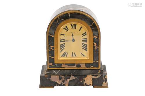 A TIFFANY AND CO. BROWN MARBLE AND GILT METAL MANTEL CLOCK