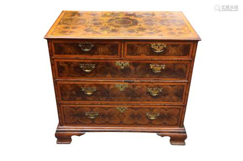 A WALNUT AND OYSTER VENEERED CHEST OF DRAWERS, ELEMENTS LATE...