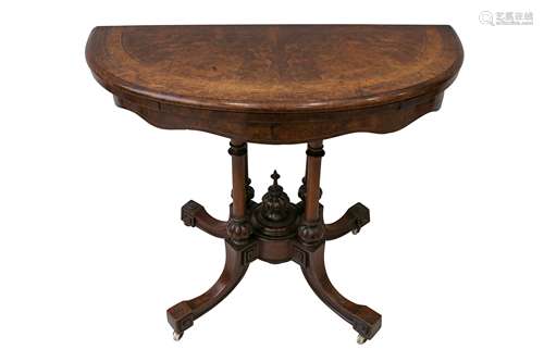 A VICTORIAN BURR WALNUT DEMI LUNE CARD TABLE, 19TH CENTURY