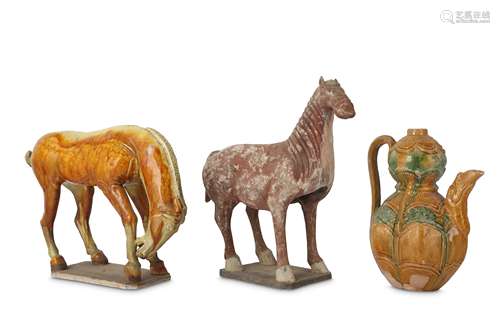 TWO CHINESE POTTERY FIGURES OF HORSES.