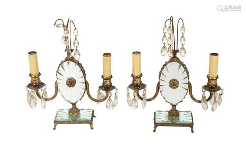 A PAIR OF TWO BRANCH BRASS AND GLASS CANDELABRA, IN THE MANN...