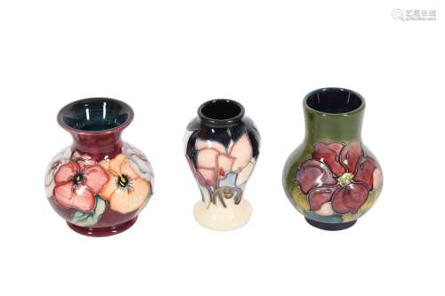 MOORCROFT, A BALUSTER VASE DECORATED WITH CYCLAMEN PATTERN