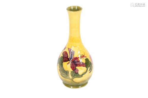 MOORCROFT, A BOTTLE VASE DECORATED WITH THE HIBISCUS PATTERN