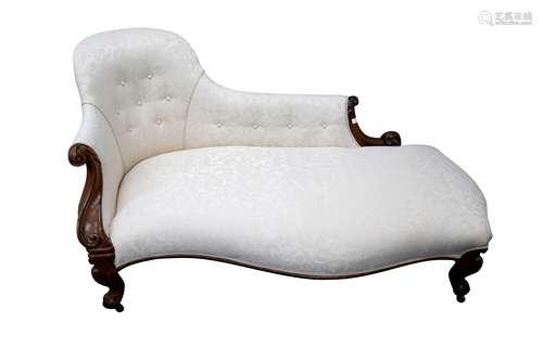 A VICTORIAN ROSEWOOD AND SERPENTINE CHAISE LONGUE