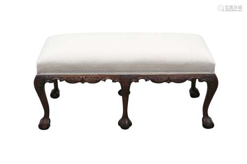 A MAHOGANY RECTANGULAR STOOL, IN THE GEORGE II STYLE, 20TH C...