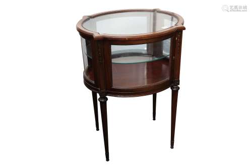 AN OVAL MAHOGANY VITRINE, IN THE NEOCLASSICAL TASTE, EARLY 2...
