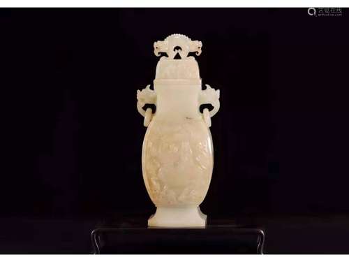 A JADE CARVED VASE AND COVER