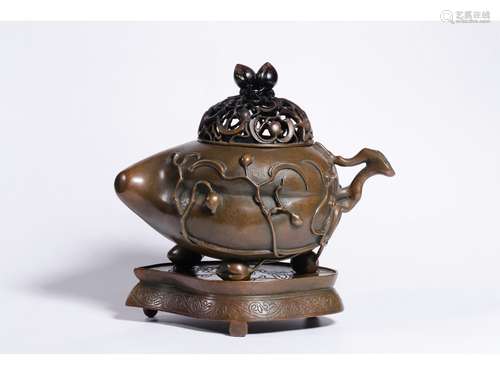 A BRONZE CENSER AND COVER