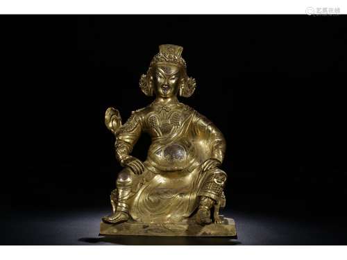 A GILT-BRONZE FIGURE OF WEALTHGOD