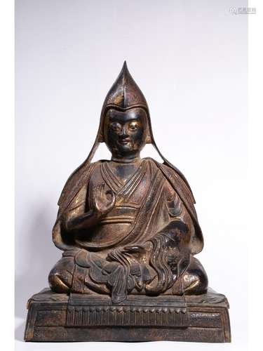 A BRONZE FIGURE OF TSONG KHAPA