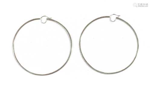 A pair of large white gold diamond set hoop earrings,