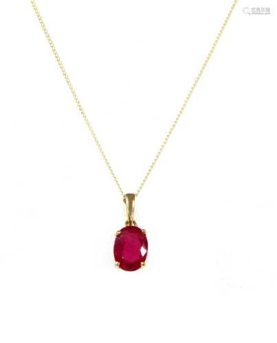 A gold single stone ruby pendant,