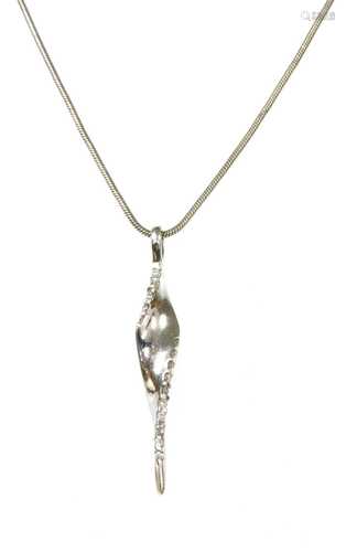 A 9ct white gold diamond pendant,