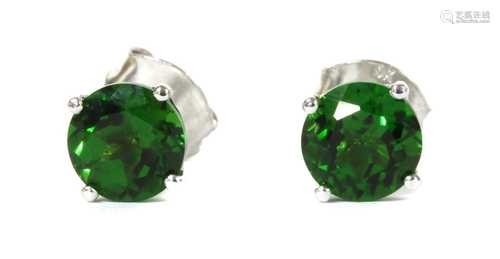 A pair of white gold single stone chrome diopside stud earri...