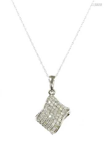 A white gold diamond pendant,