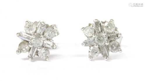 A pair of white gold diamond cluster earrings,