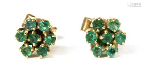 A pair of gold emerald cluster earrings,