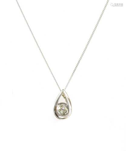 An 18ct white gold single stone diamond pendant,