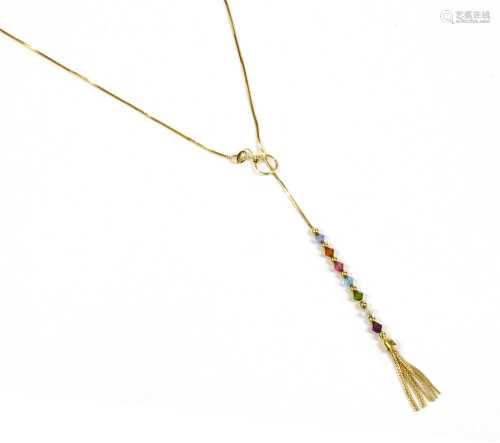 A gold glass bead lariat necklace,