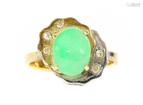 A two colour gold jade and diamond ring,