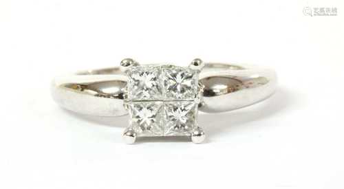 A white gold princess cut diamond ring,