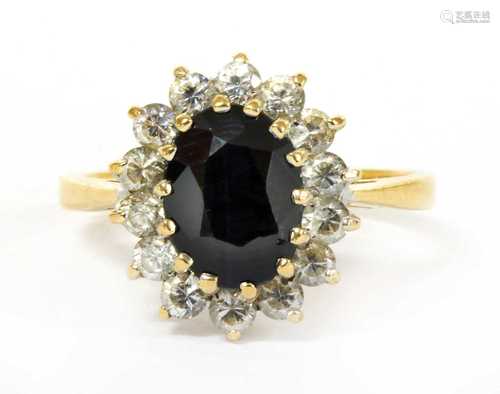 A 9ct gold sapphire and diamond cluster ring,