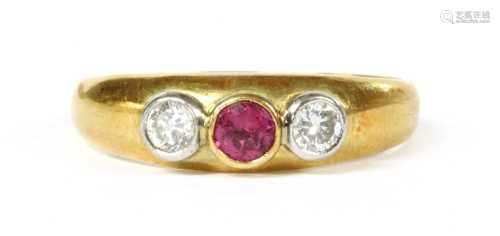 An 18ct gold ruby and diamond three stone ring,