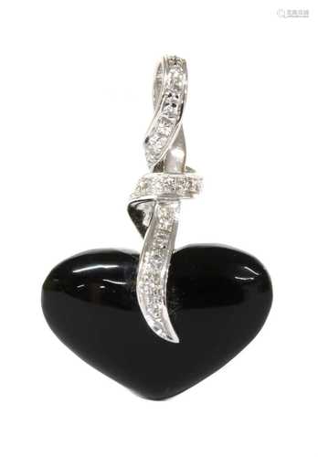 A white gold onyx and diamond heart pendant,