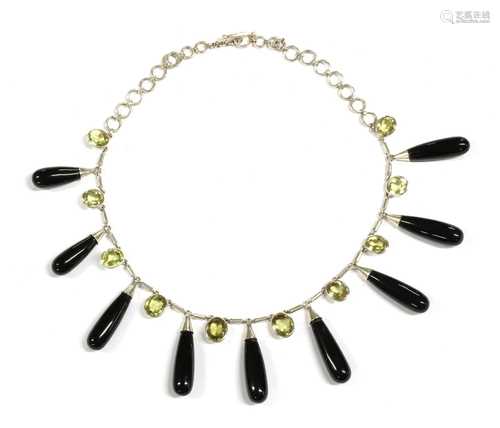 A silver onyx and citrine fringe necklace,