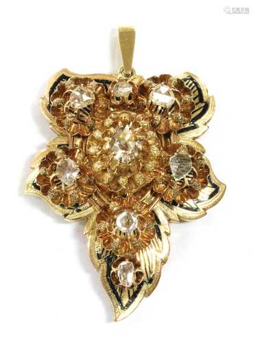 A gold diamond set leaf pendant,