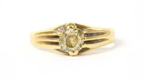 A gold single stone diamond ring,