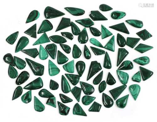 A large quantity of freeform malachite cabochons,