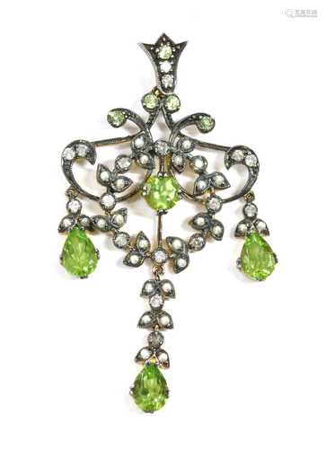 A silver and gold, peridot, split pearl and diamond pendant,