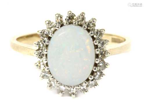 A 9ct gold opal and diamond cluster ring,