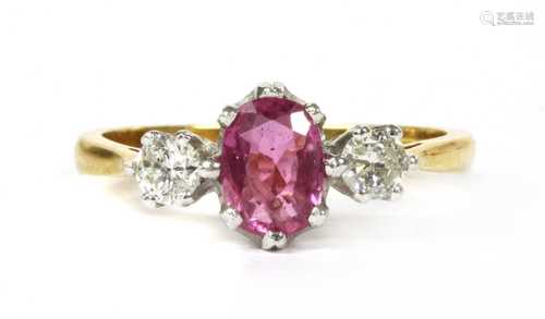 An 18ct gold pink sapphire and diamond three stone ring,