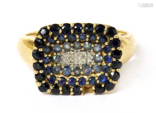 A 9ct gold diamond and sapphire cluster ring,