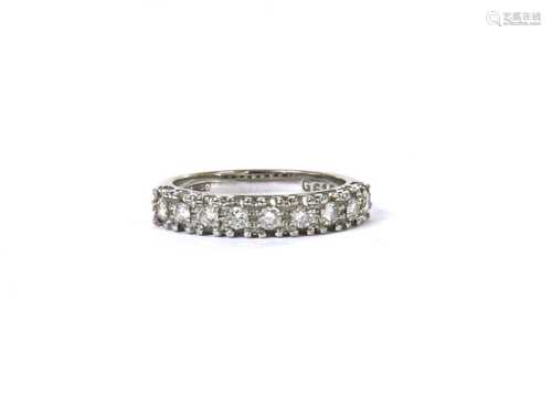 A white gold nine stone diamond ring,