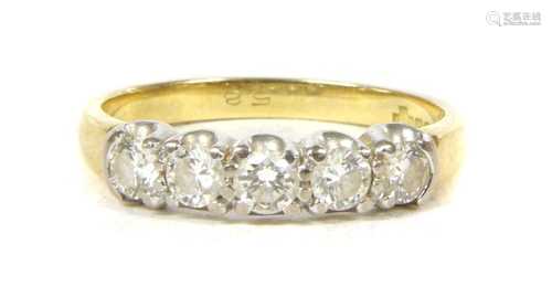 An 18ct gold five stone diamond ring,