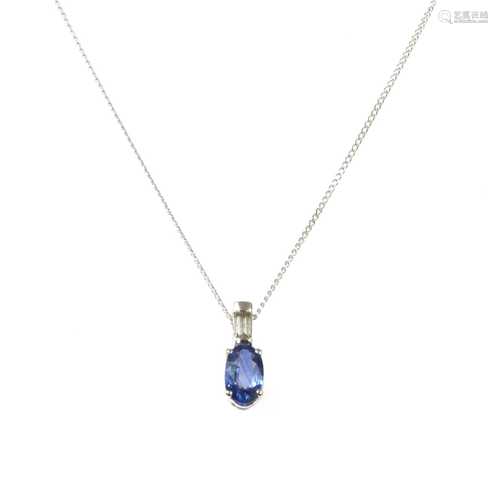 A white gold sapphire and diamond pendant,