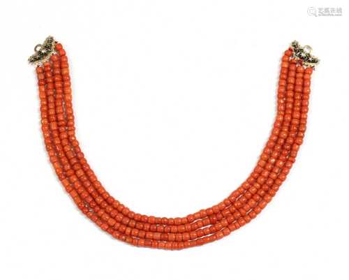 A four row coral bead necklace,