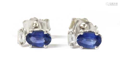 A pair of white gold sapphire and diamond stud earrings,