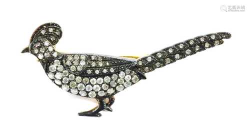 A silver diamond set pheasant brooch,