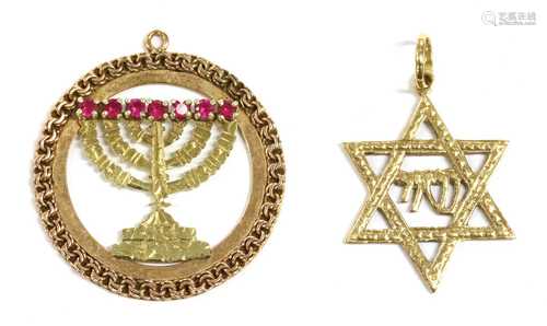 A gold Star of David pendant,