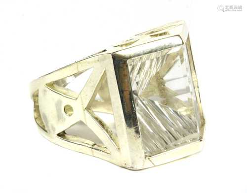 A silver single stone rock crystal quartz ring,