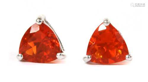 A pair of white gold single stone fire opal stud earrings,